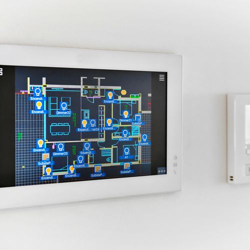 Adjusting a wall thermostat from a tablet app in the same room