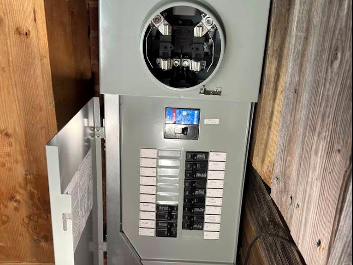 Whole-home surge protective device installed at the meter base and load center