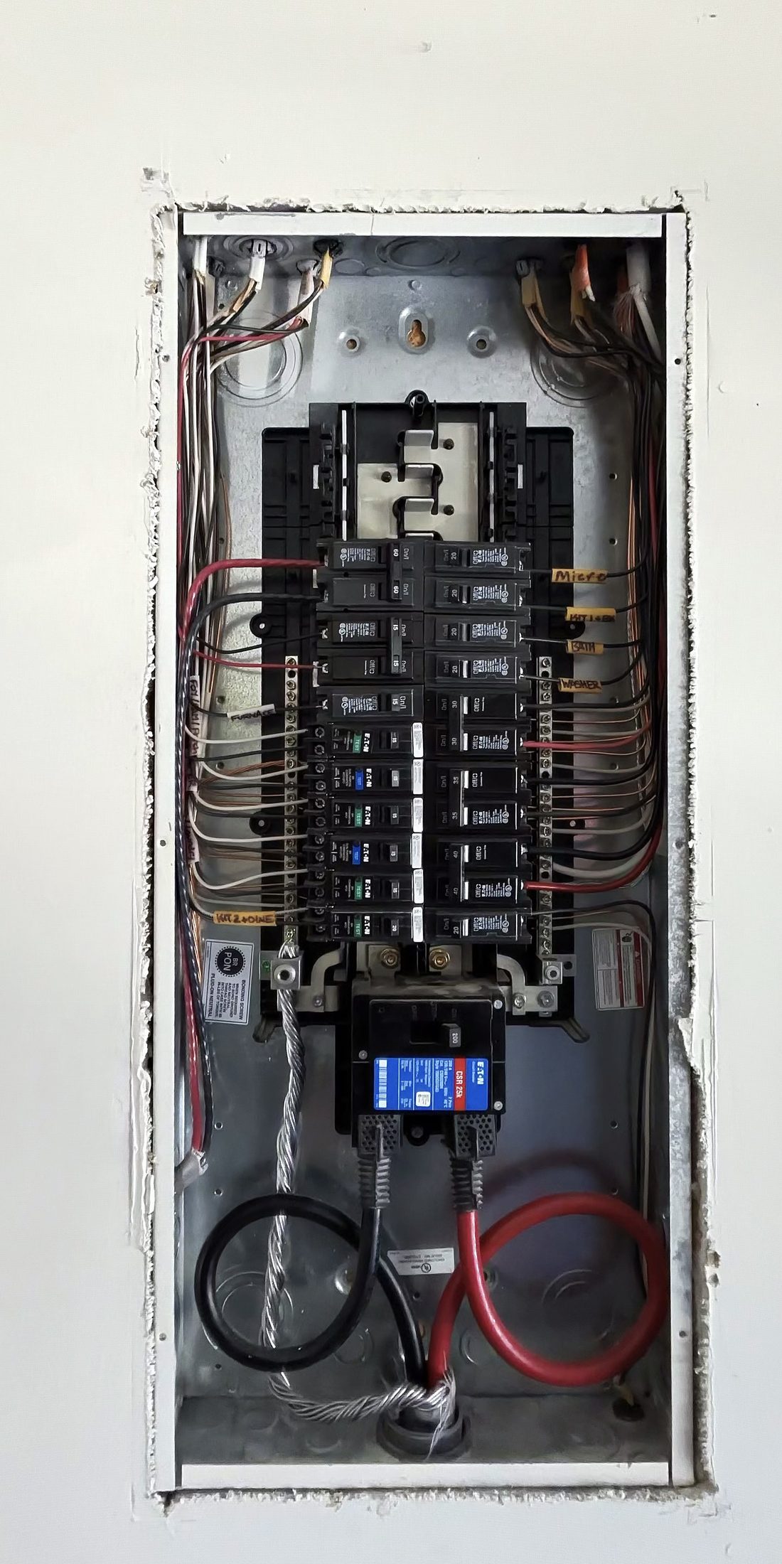 200-amp Eaton panel changeout in Winston-Salem NC with labeled circuits and clean wire management by Amped Up Electrical Solutions